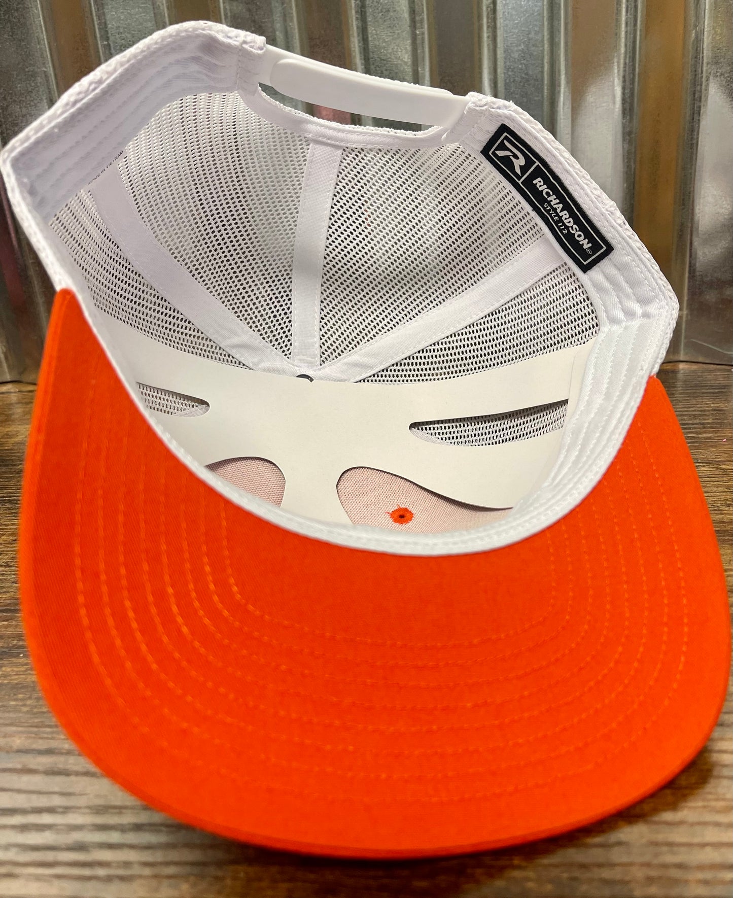 Custom leather patch trucker hat orange/white