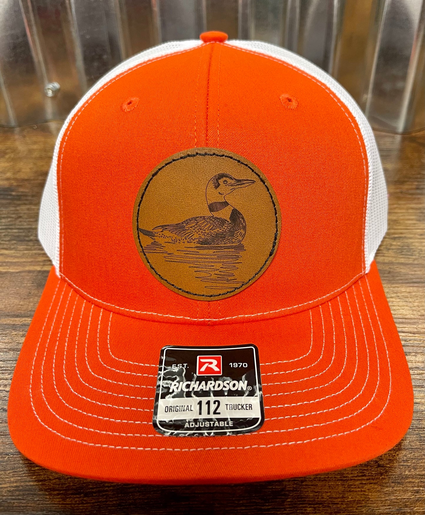 Custom leather patch trucker hat orange/white