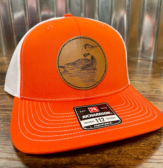 Custom leather patch trucker hat orange/white