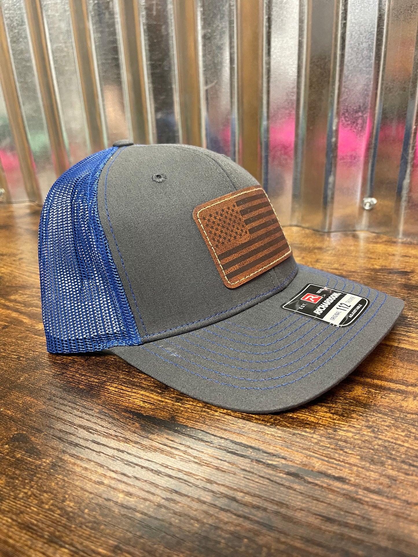 Grey/blue trucker hat custom leather patch