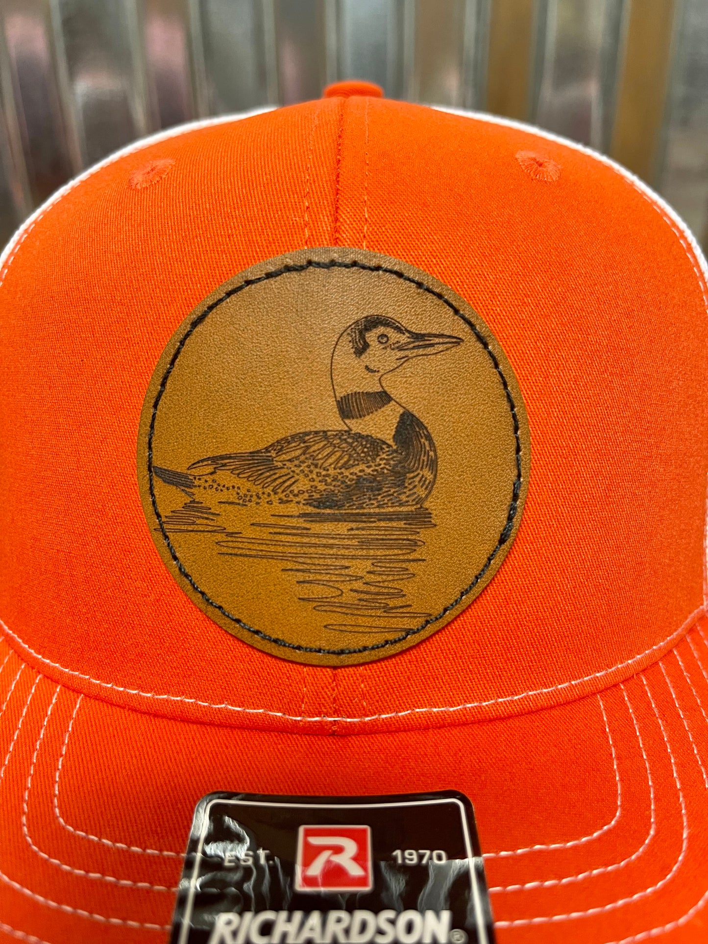 Custom leather patch trucker hat orange/white